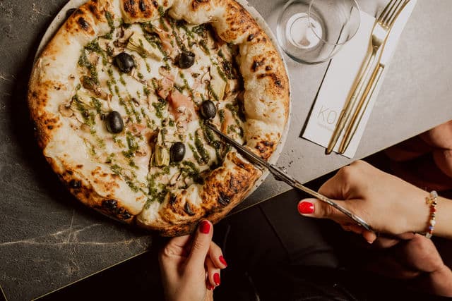 A pizza being cooked in a special way