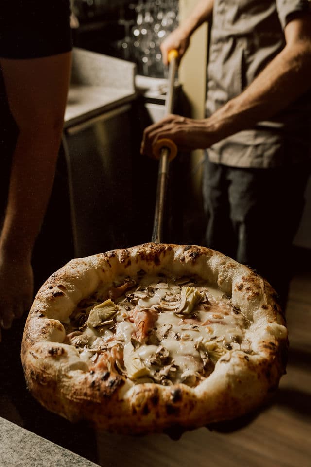 A pizza being cooked in a special way